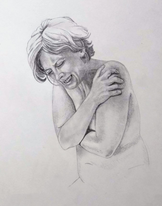 woman bent over crying